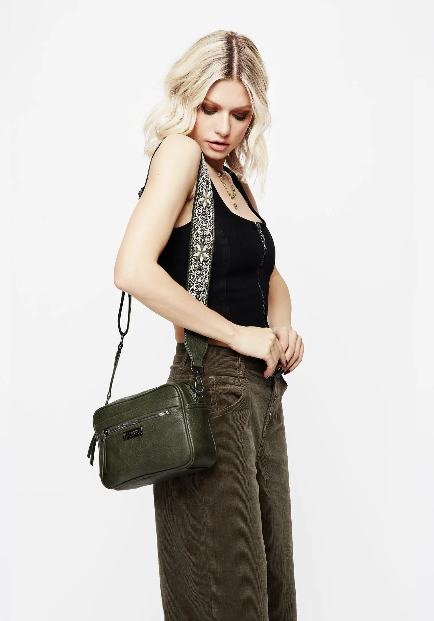 Portent Debossed Zip Front Crossbody Bag