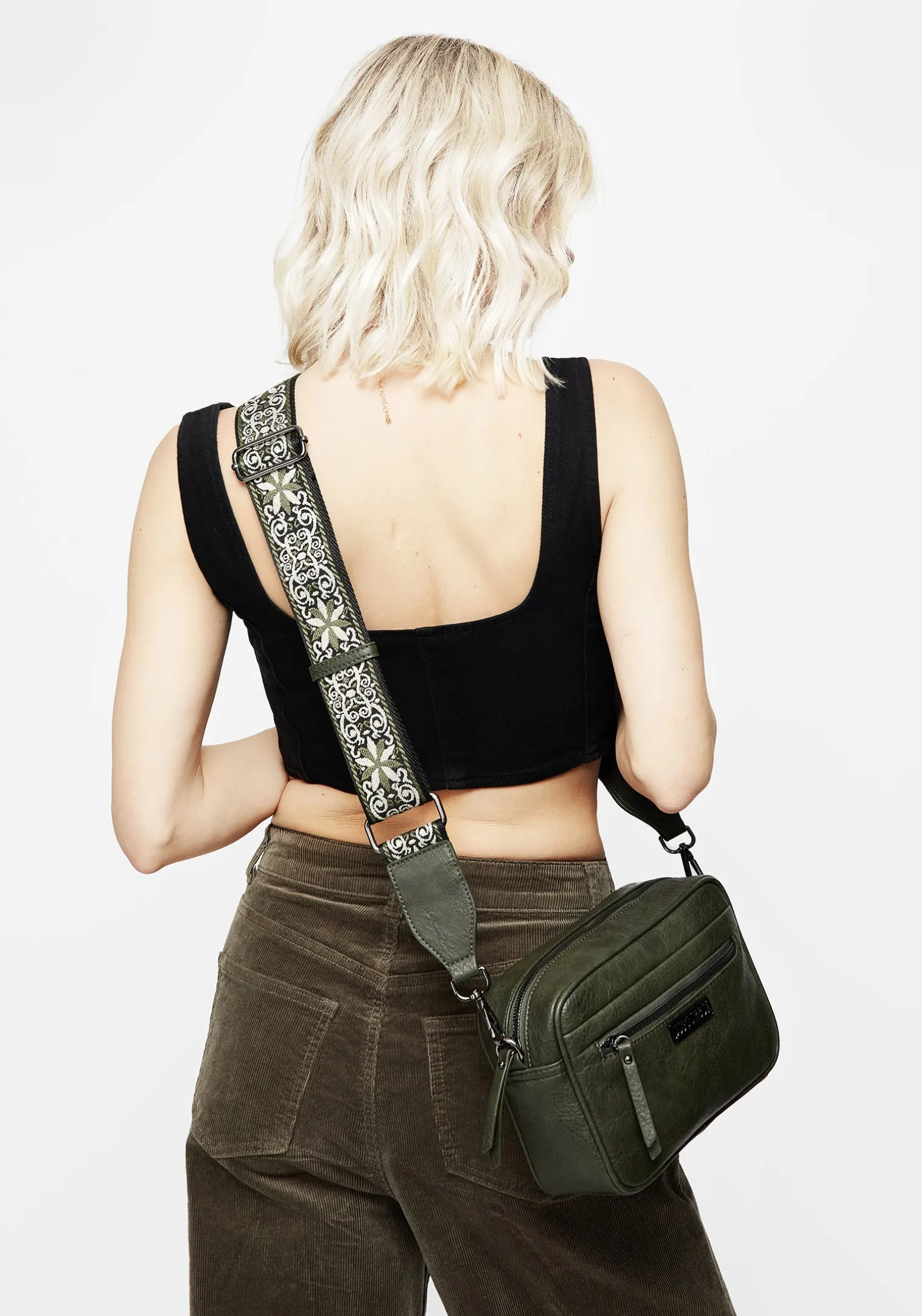 Portent Debossed Zip Front Crossbody Bag